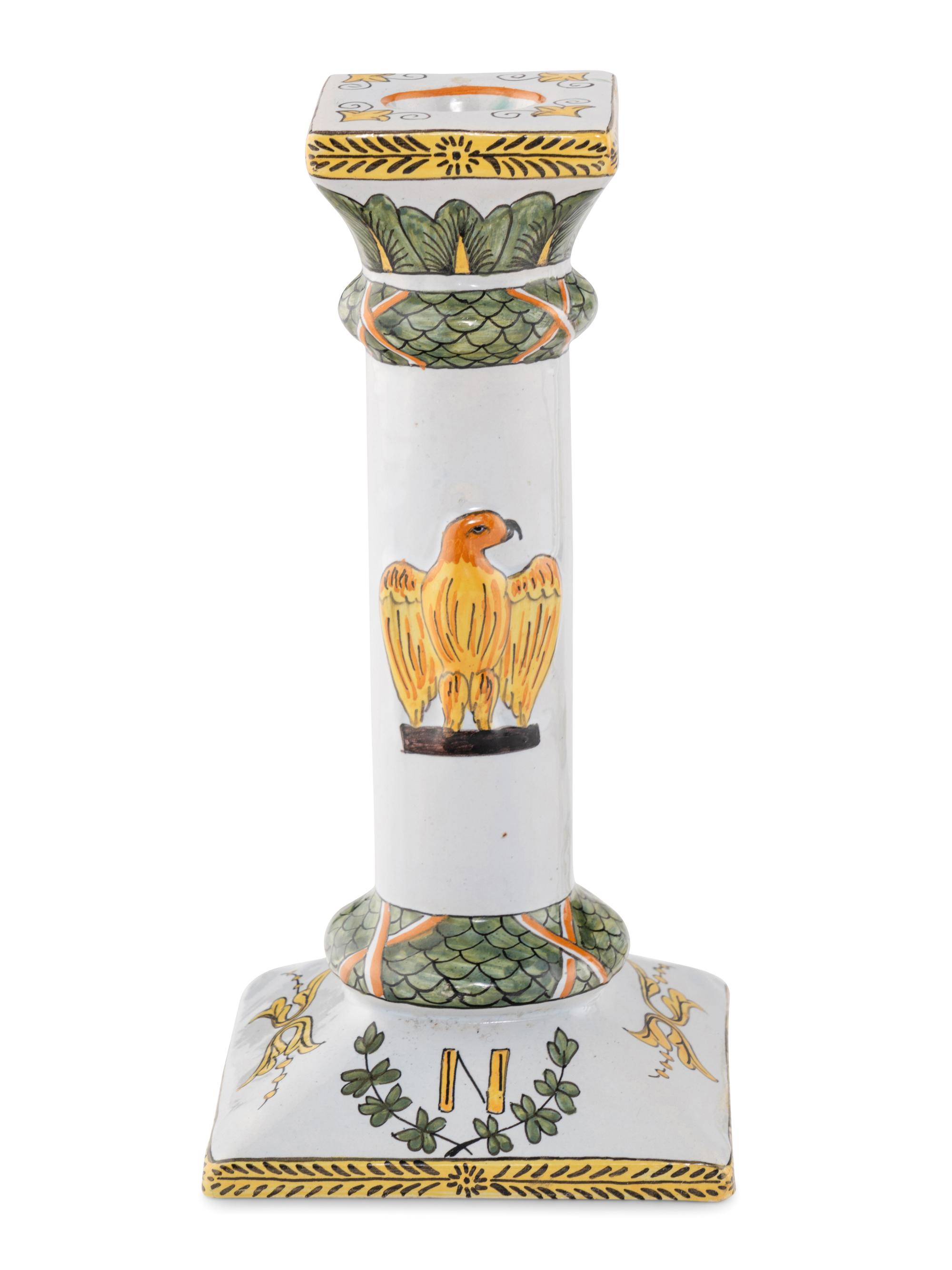 A Set of Four French Faience Candlesticks