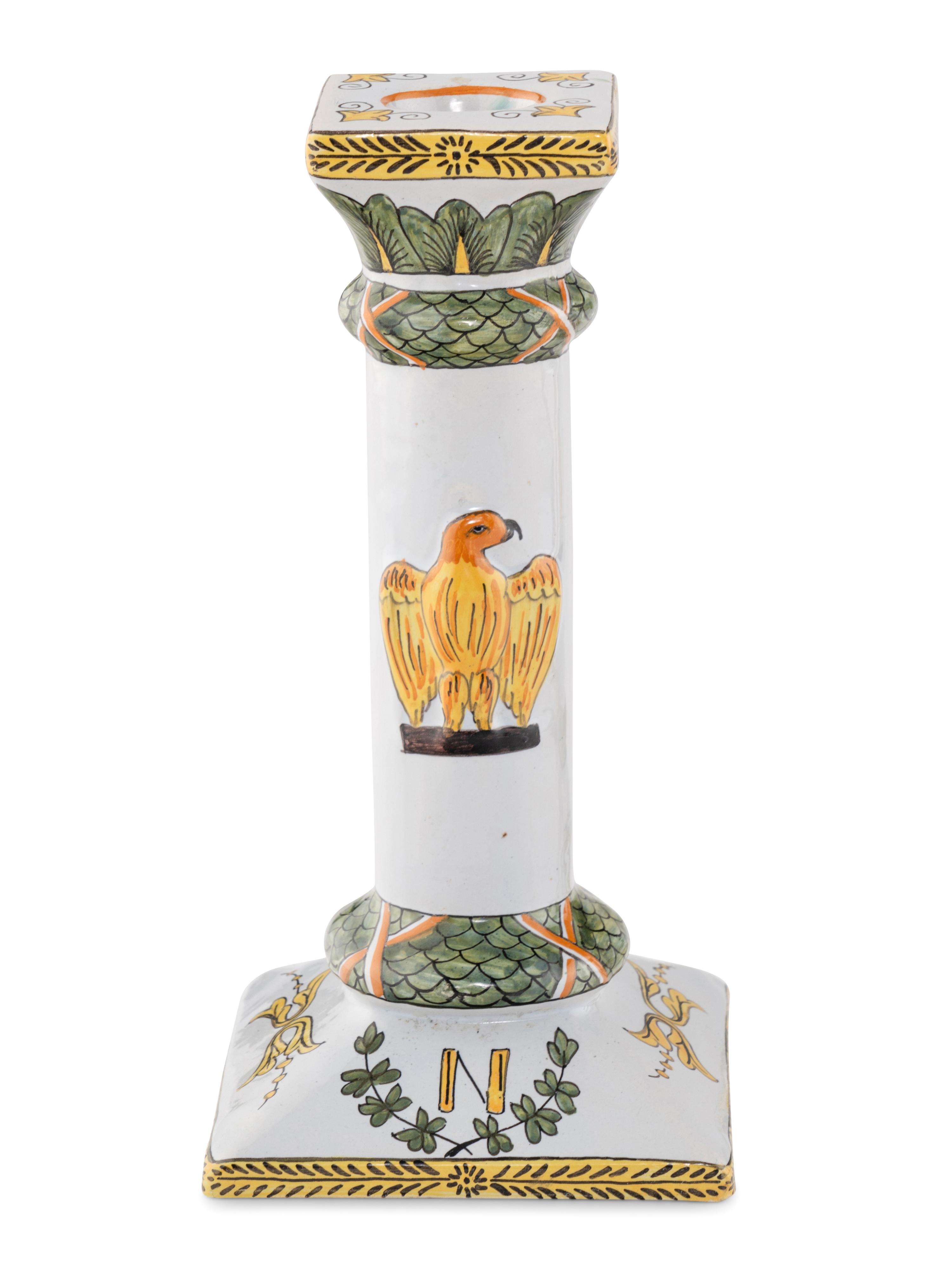 A Set of Four French Faience Candlesticks