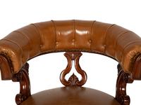 A Pair of William IV Style Leather-Upholstered Mahogany Armchairs