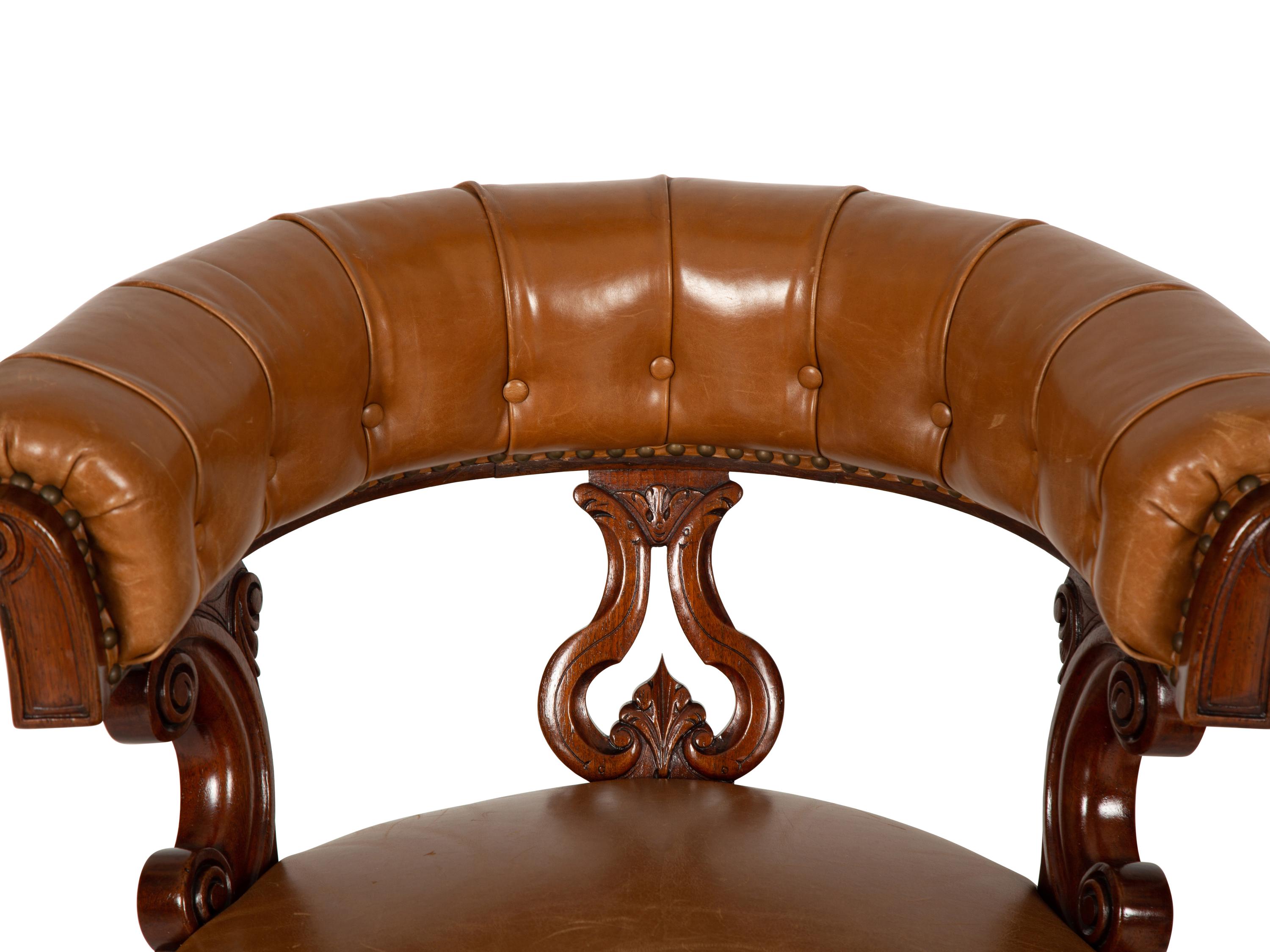 A Pair of William IV Style Leather-Upholstered Mahogany Armchairs