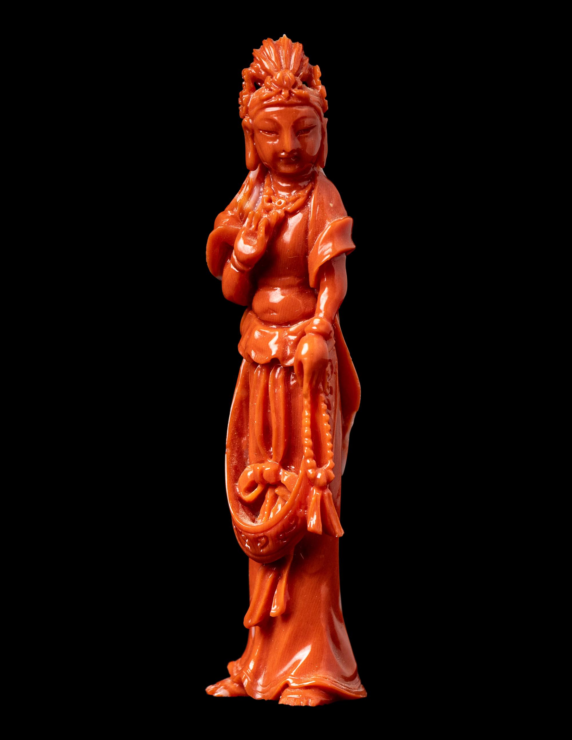 A Small Chinese Red Coral Figure of Guanyin