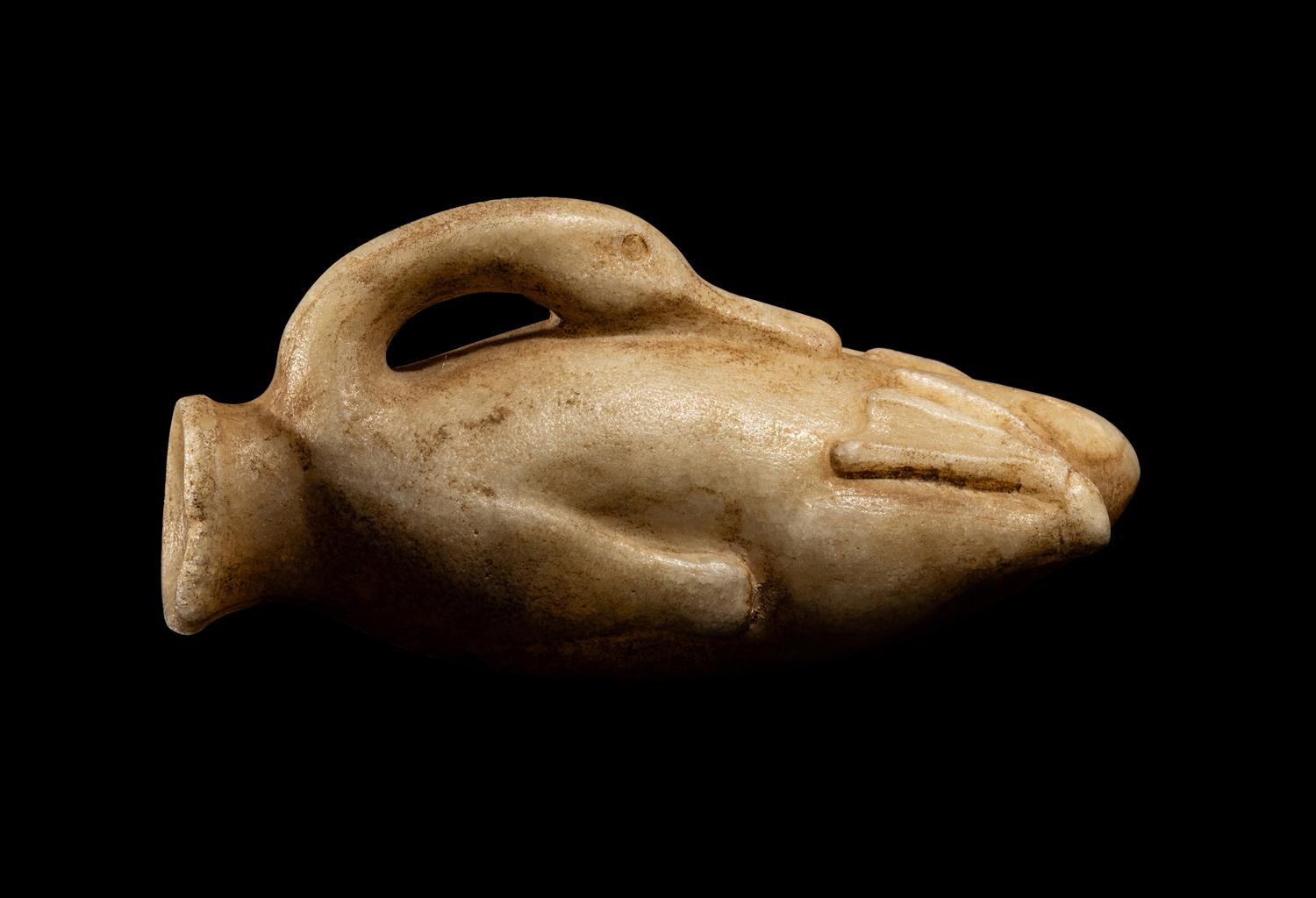 An Egyptian Alabaster Duck Cosmetic Vessel