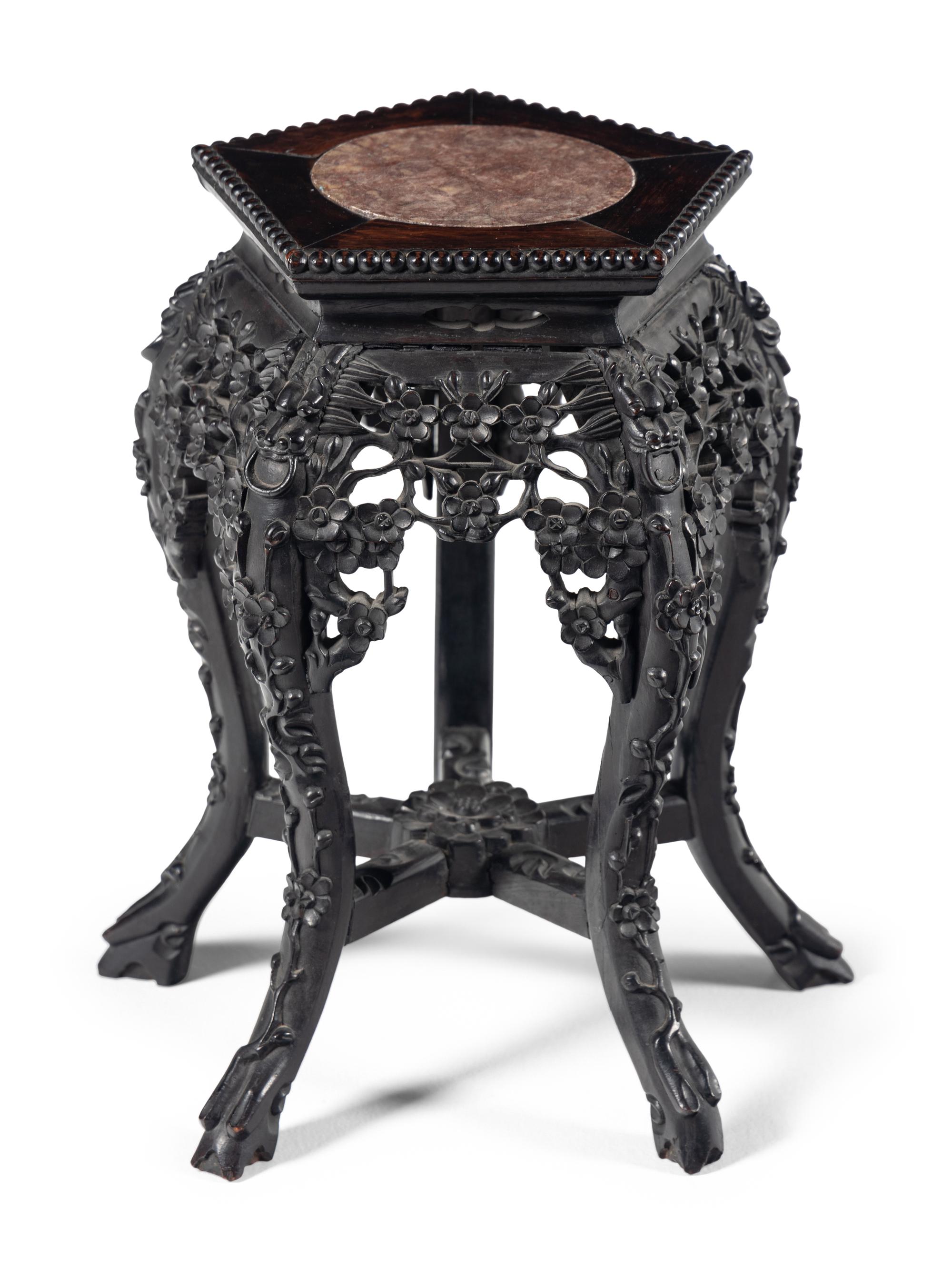 A Chinese Export Carved Hardwood Stand