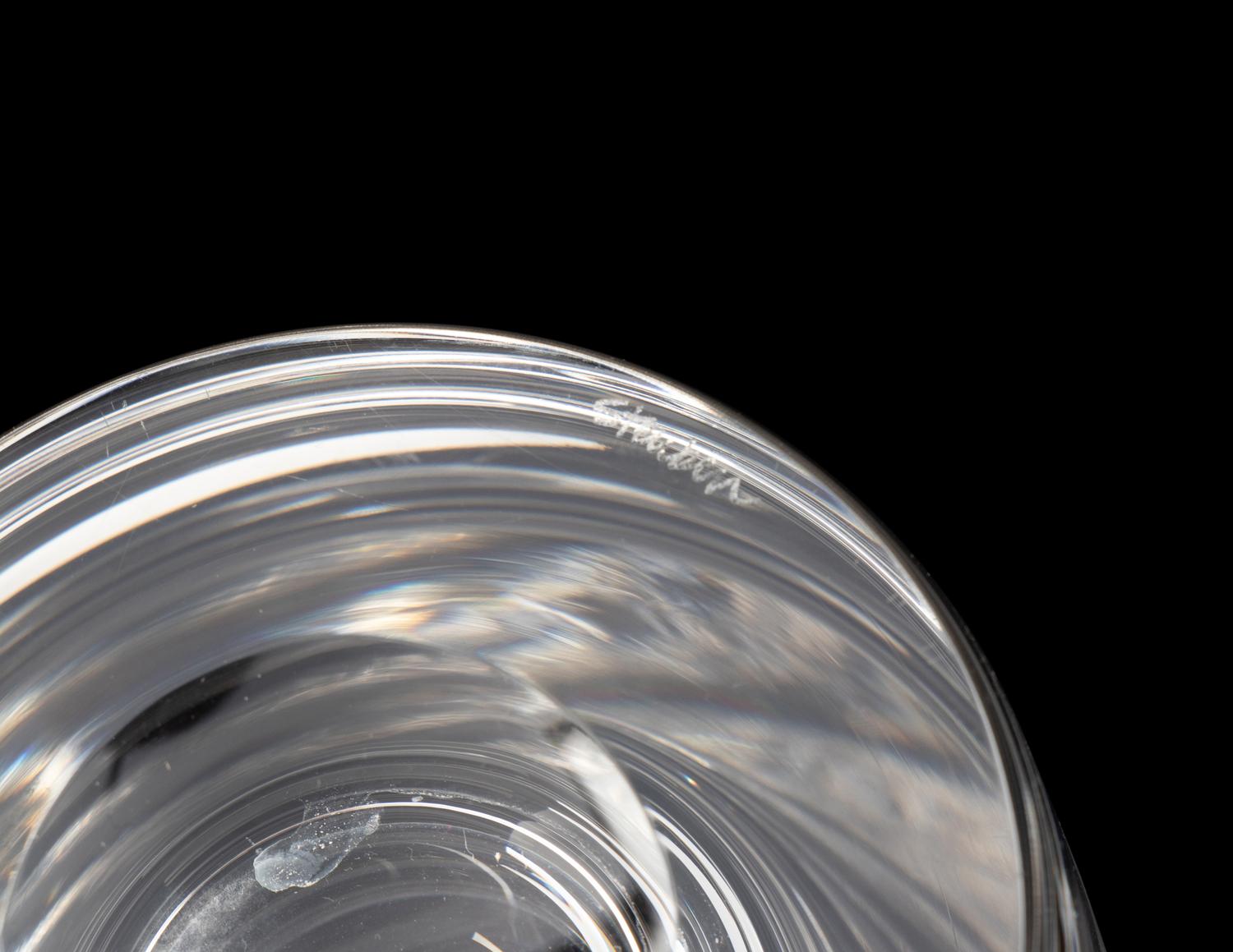 A Group of Three Glass Decanters