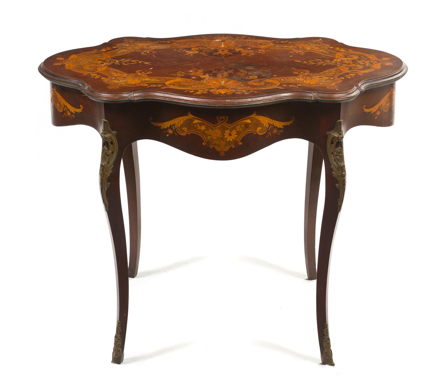 A Continental Marquetry, Mother-of-Pearl Inlaid and Gilt Metal Mounted Center Table, Height 29 1/4 x width 36 x depth 24 inches.