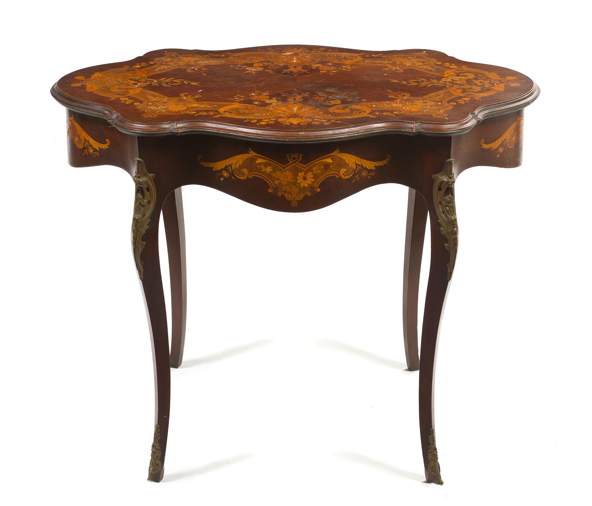 A Continental Marquetry, Mother-of-Pearl Inlaid and Gilt Metal Mounted Center Table, Height 29 1/4 x width 36 x depth 24 inches.