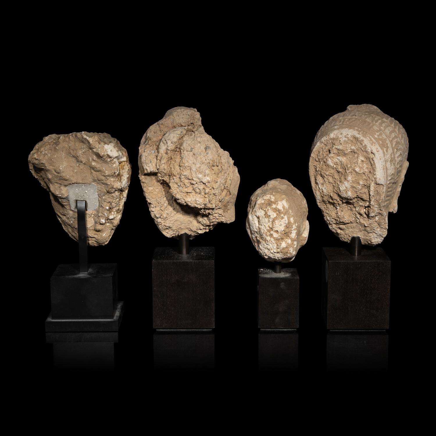 Four Gandharan Terracotta Heads of Buddha, 3rd-5th Century