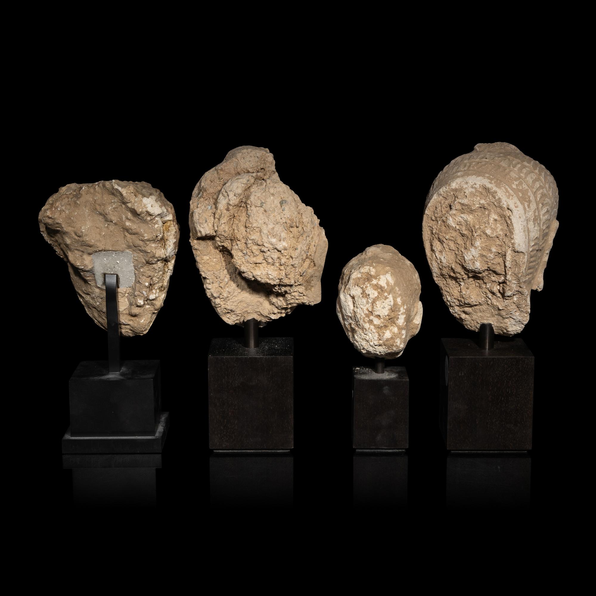 Four Gandharan Terracotta Heads of Buddha, 3rd-5th Century