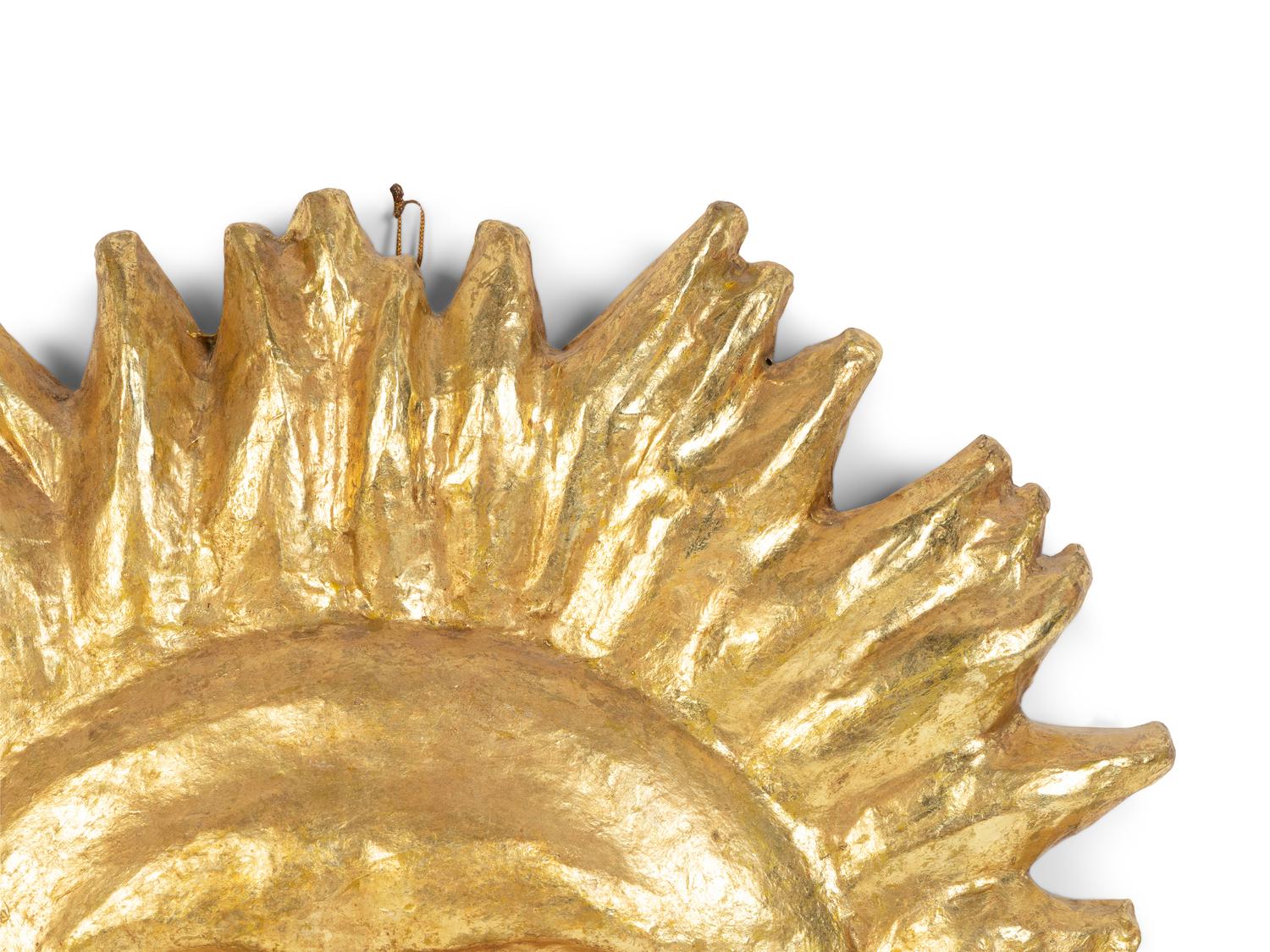 A Papier-Mâché Sunburst Appliqué