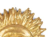A Papier-Mâché Sunburst Appliqué