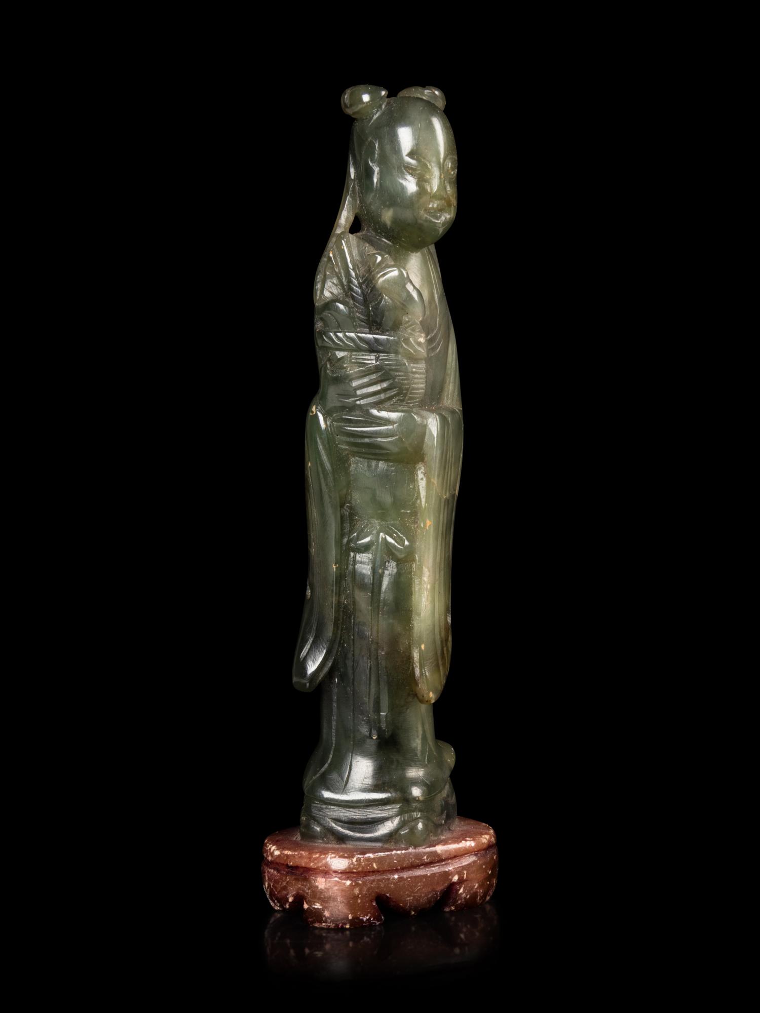 A Chinese White Jade Reticulated Plaque