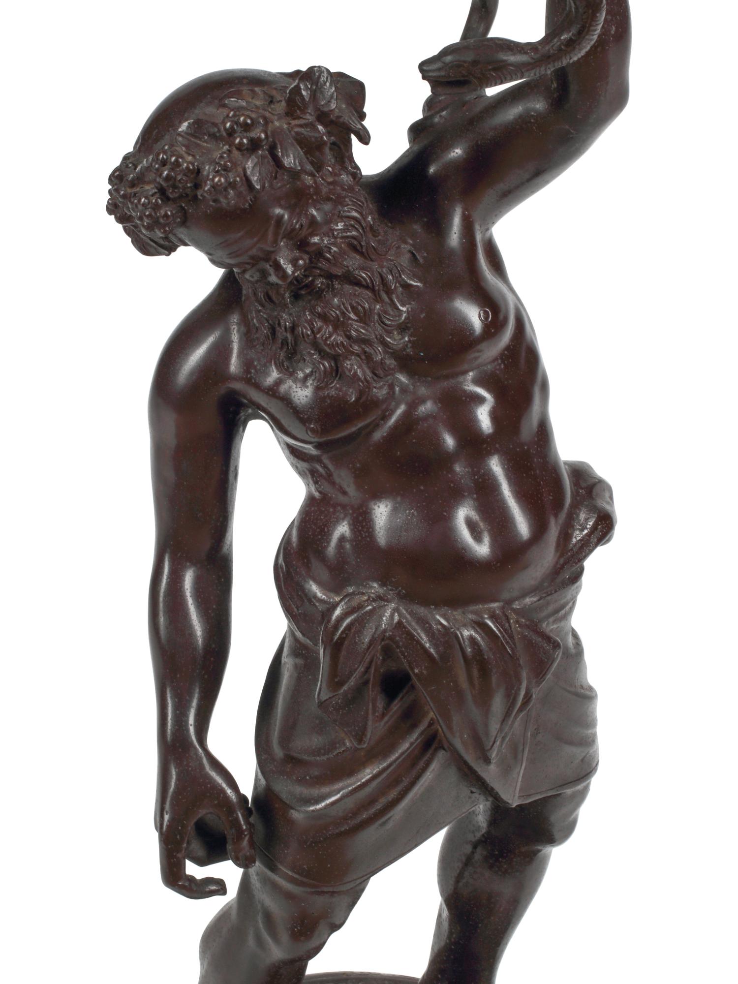 A Patinated Bronze Figure of Silenus with a Rock Crystal Ornament