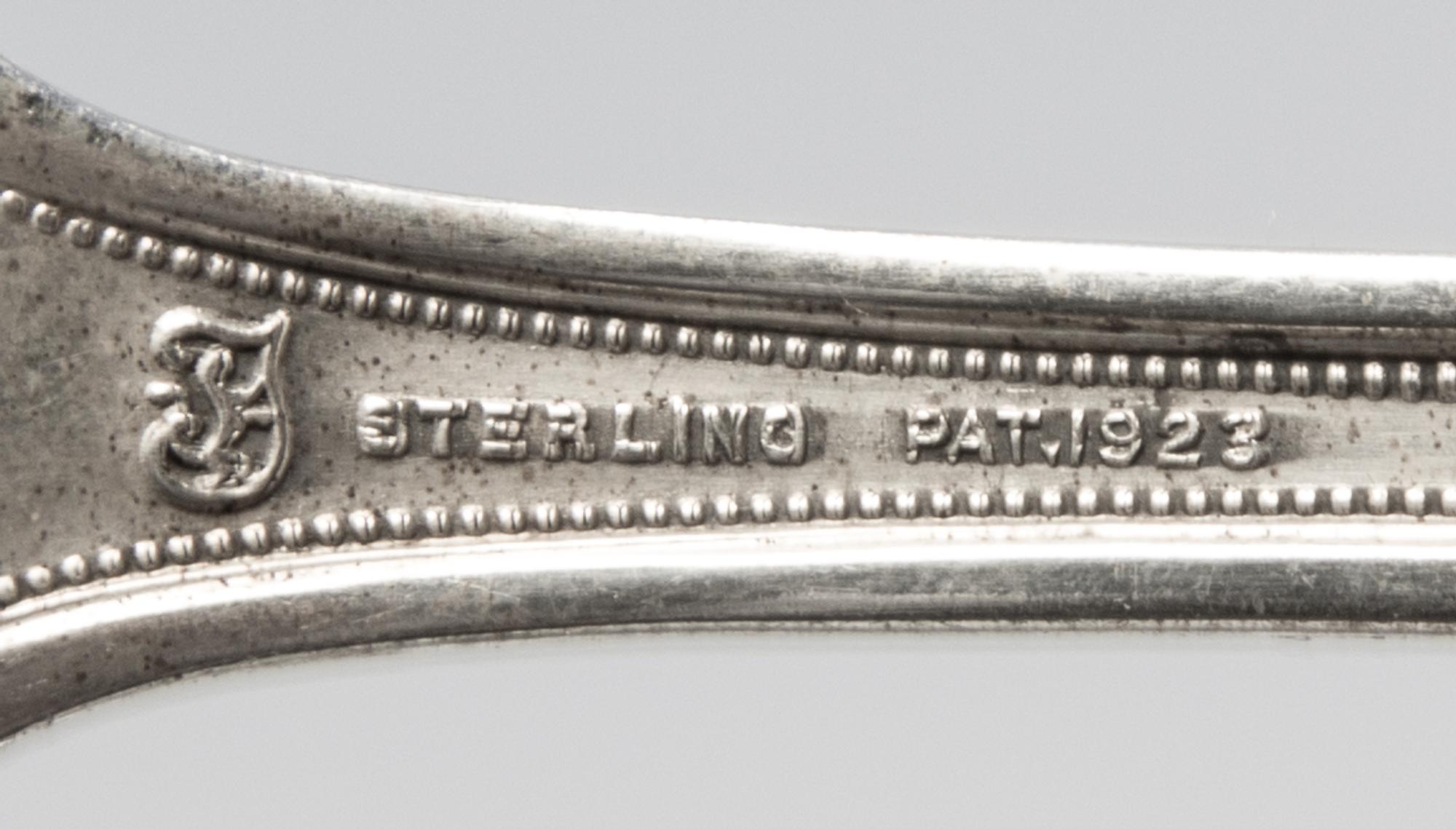 An American Silver Flatware Service, Towle Silversmiths, Newburyport, MA, D'Orleans pattern, comprising: 12 dinner knives 12 dinner for
