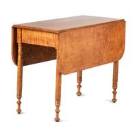 A Tiger Maple Drop Leaf Table