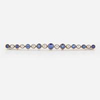 A 14K Yellow Gold, Diamond, and Sapphire Brooch