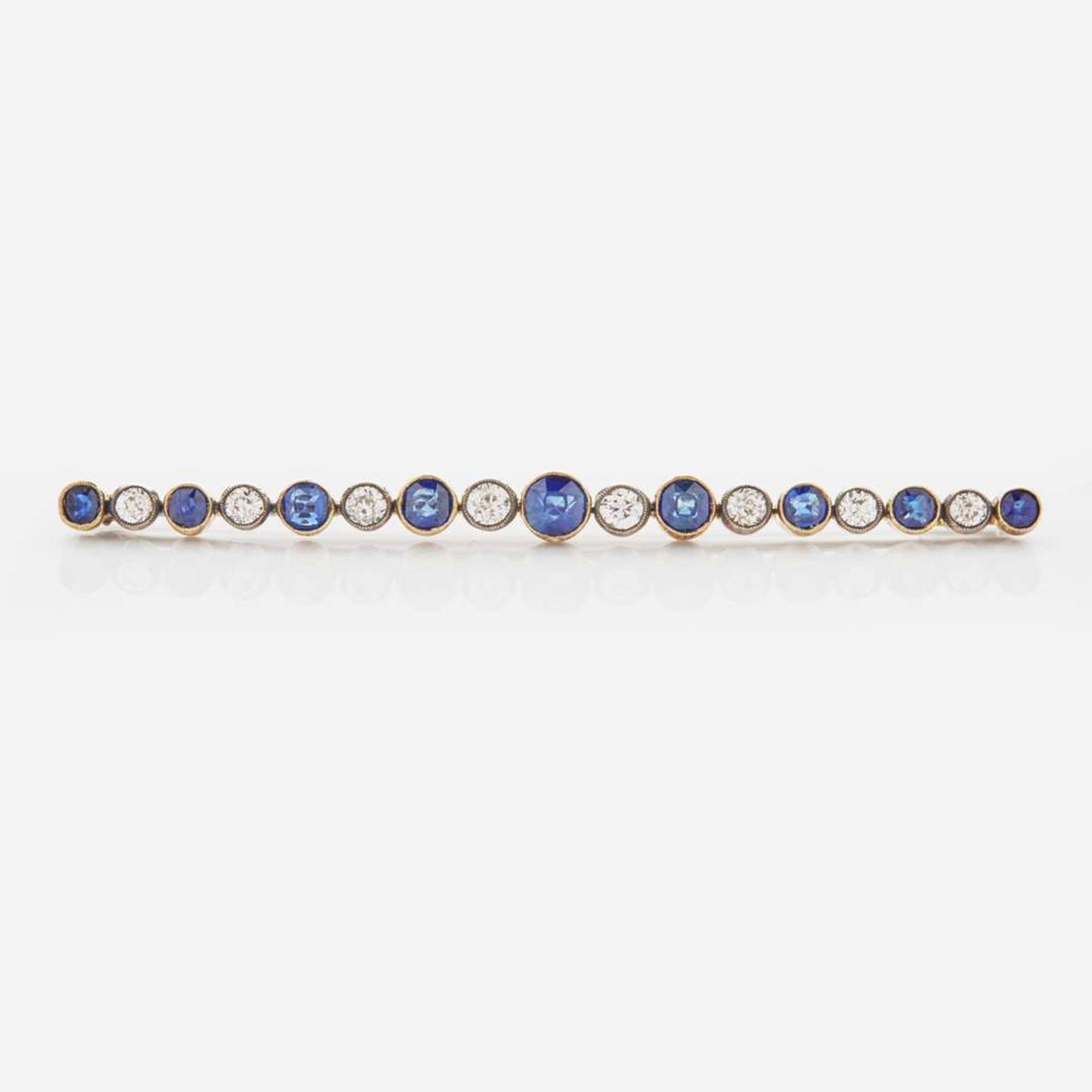 A 14K Yellow Gold, Diamond, and Sapphire Brooch