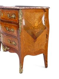 A Louis XVI Style Gilt Bronze Mounted Marquetry Marble-Top Bombe Commode