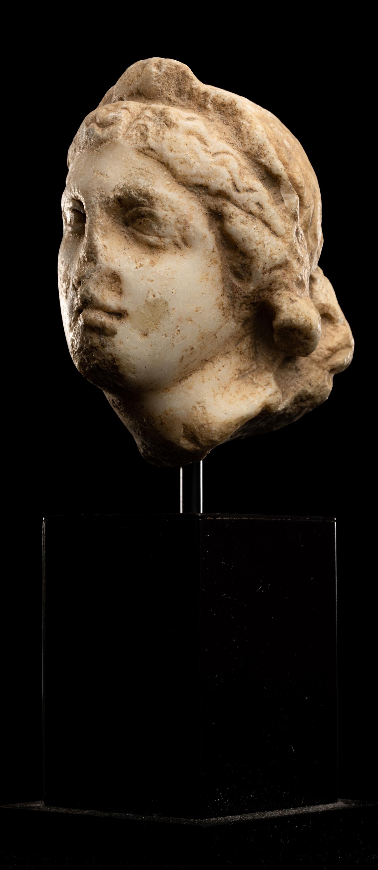 A Roman Marble Head of a Woman