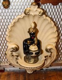 A Continental Painted Blackamoor Height 12 1/2 inches.