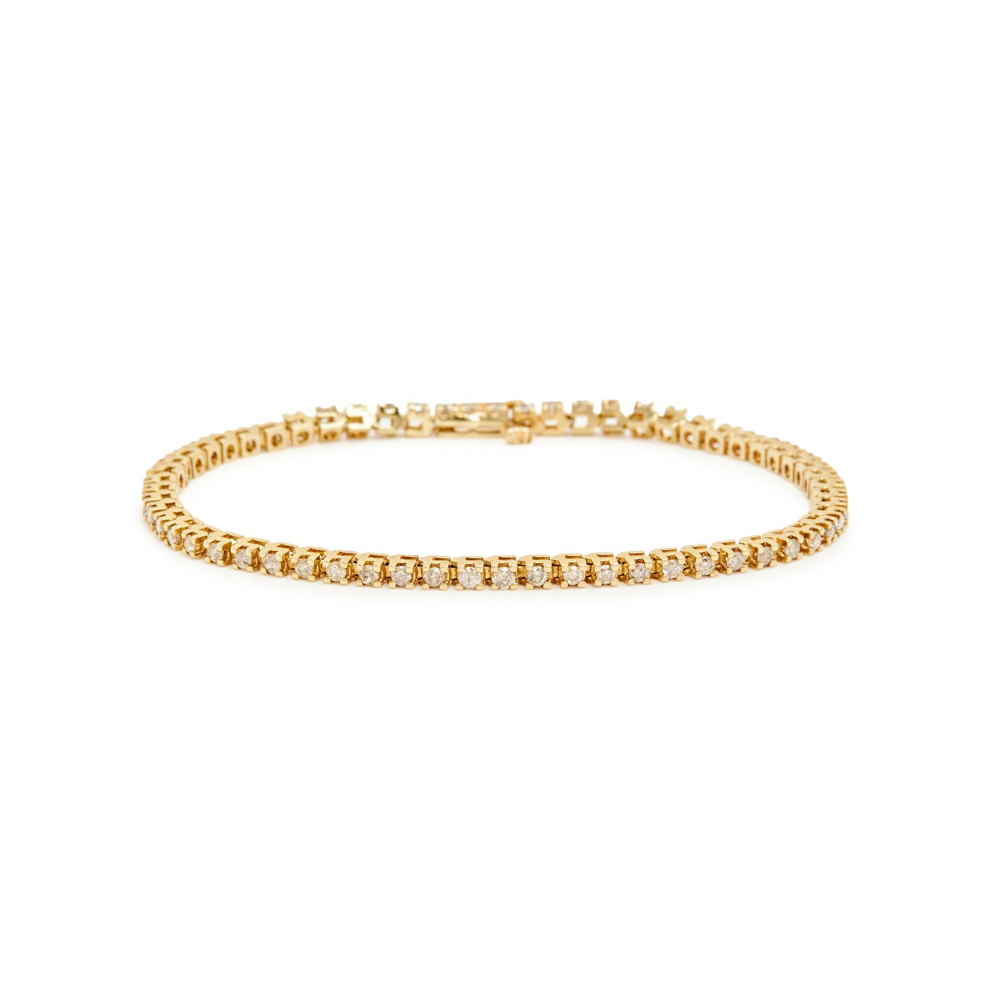 PAIR OF YELLOW GOLD AND DIAMOND LINE BRACELETS