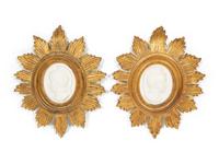 A Pair of Italian Bisque Portrait Medallions in Giltwood Frames