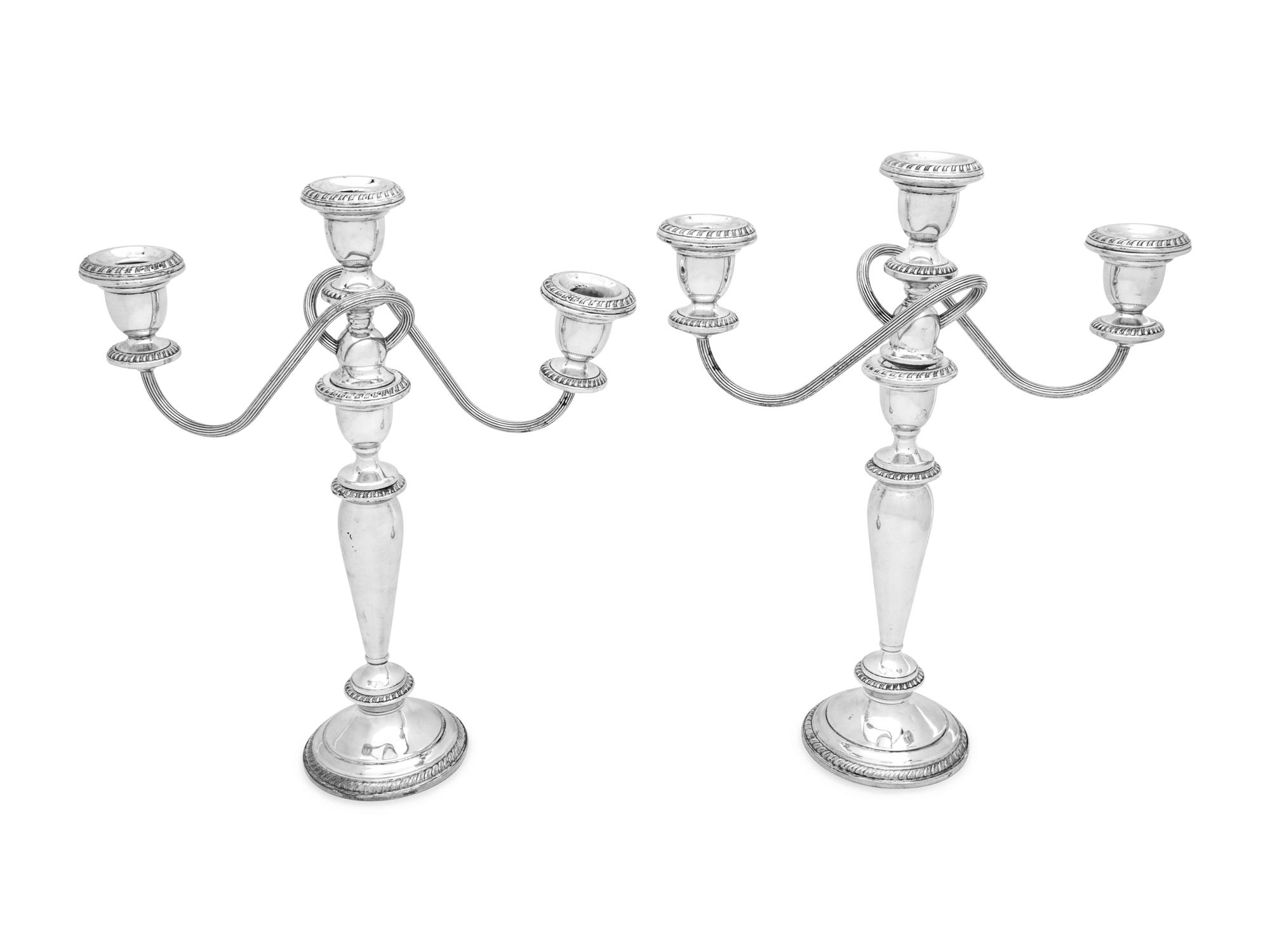 A Pair of Silver Three-Light Candelabra
