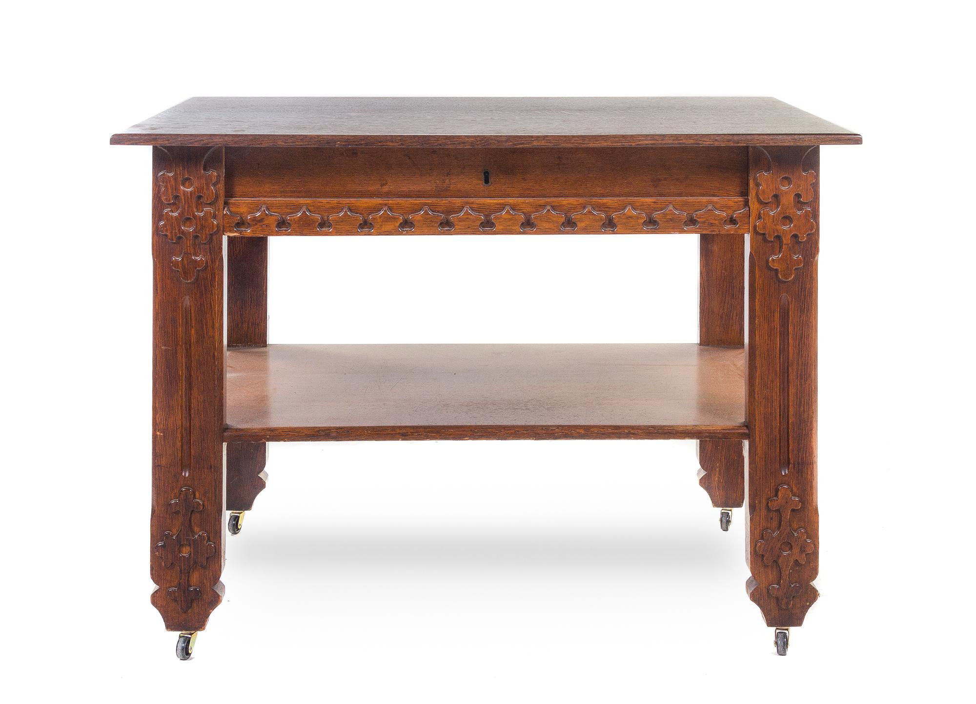 An Arts and Crafts Oak Library Table, Height 30 x width 42 x depth 26 inches.