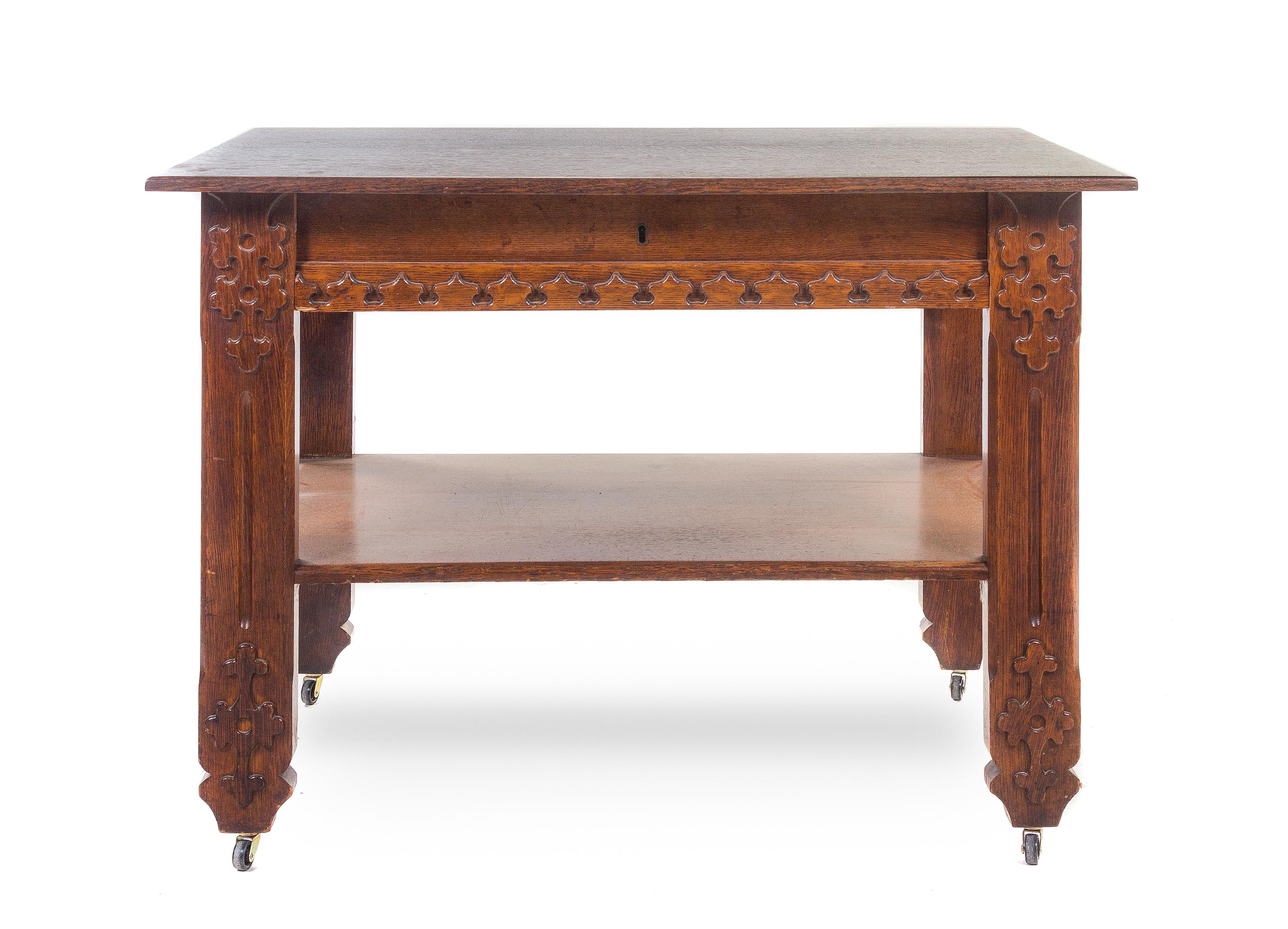 An Arts and Crafts Oak Library Table, Height 30 x width 42 x depth 26 inches.