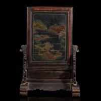 A Chinese embellished lacquer and carved hardwood table screen