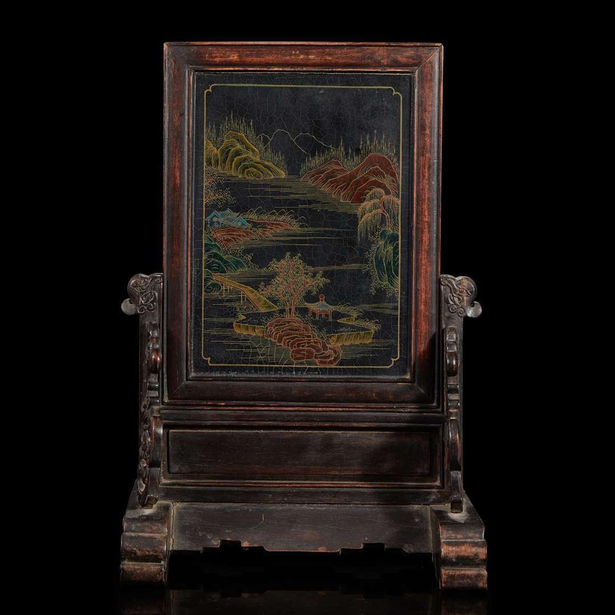 A Chinese embellished lacquer and carved hardwood table screen
