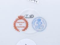 A Sèvres Porcelain Cabinet Plate and a Bisque Porcelain Bust Depicting Napoleon III