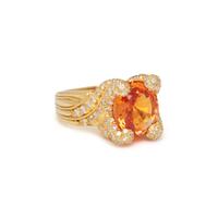 HENRY DUNAY, YELLOWISH ORANGE SAPPHIRE AND DIAMOND RING