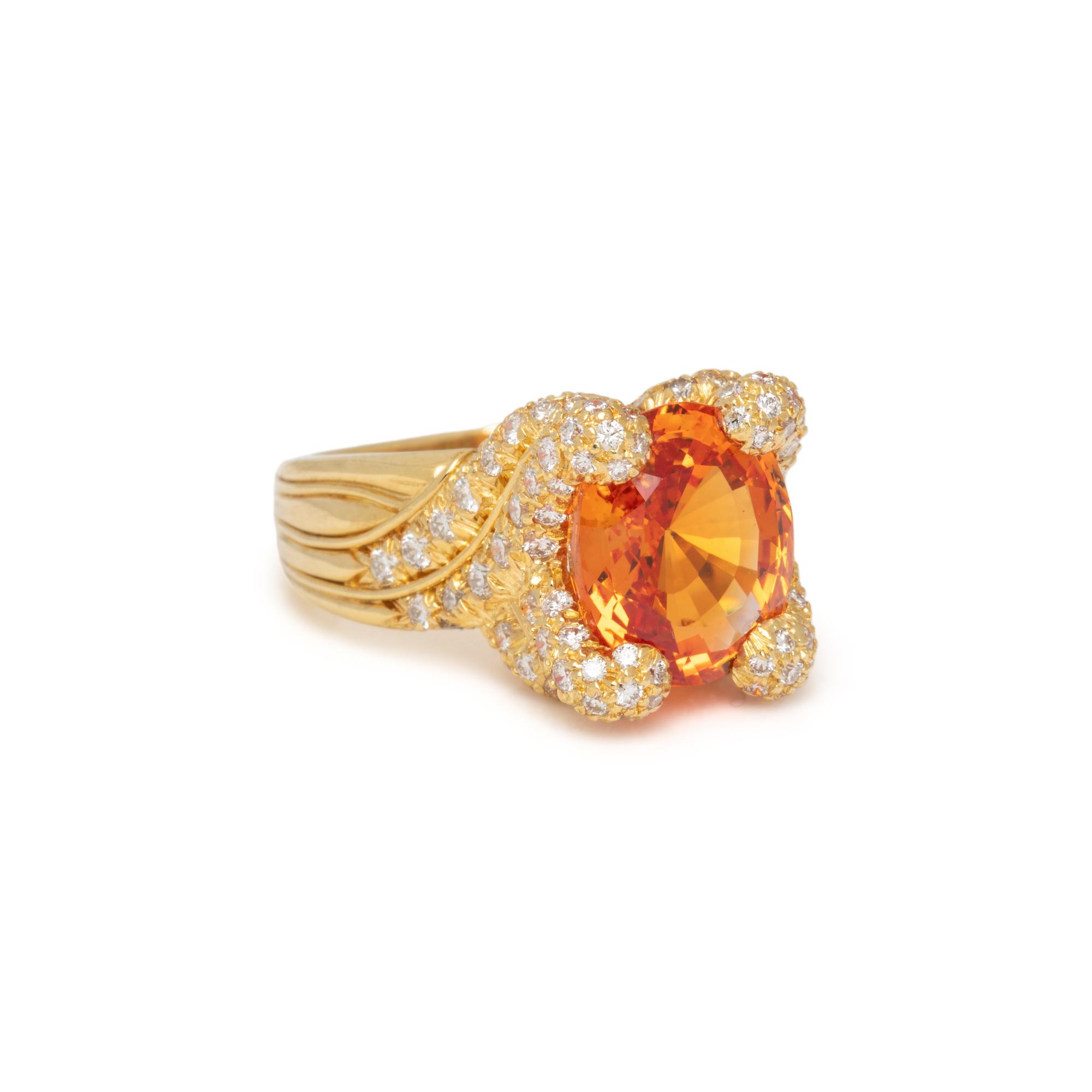 HENRY DUNAY, YELLOWISH ORANGE SAPPHIRE AND DIAMOND RING