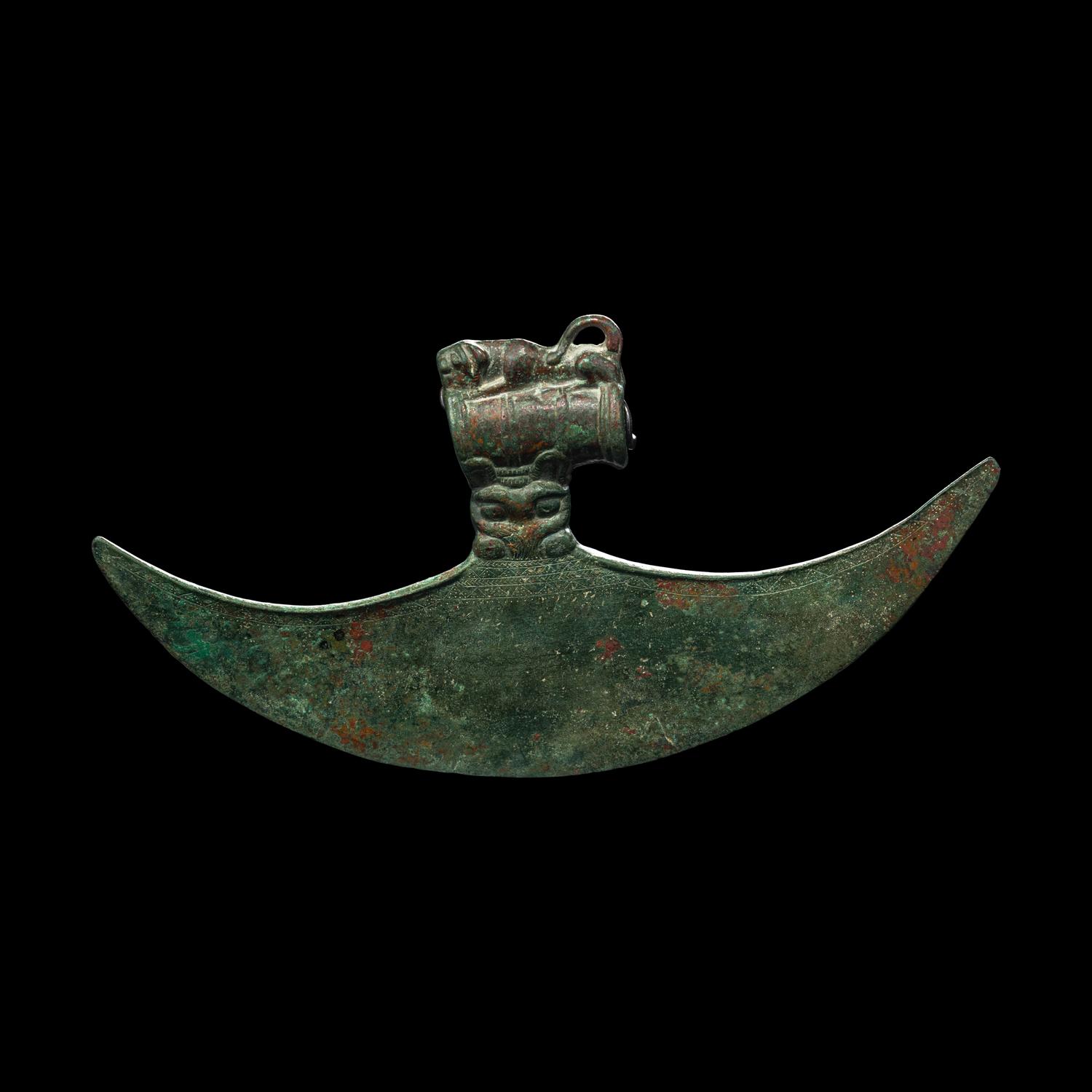 A Luristan Bronze Axe Head