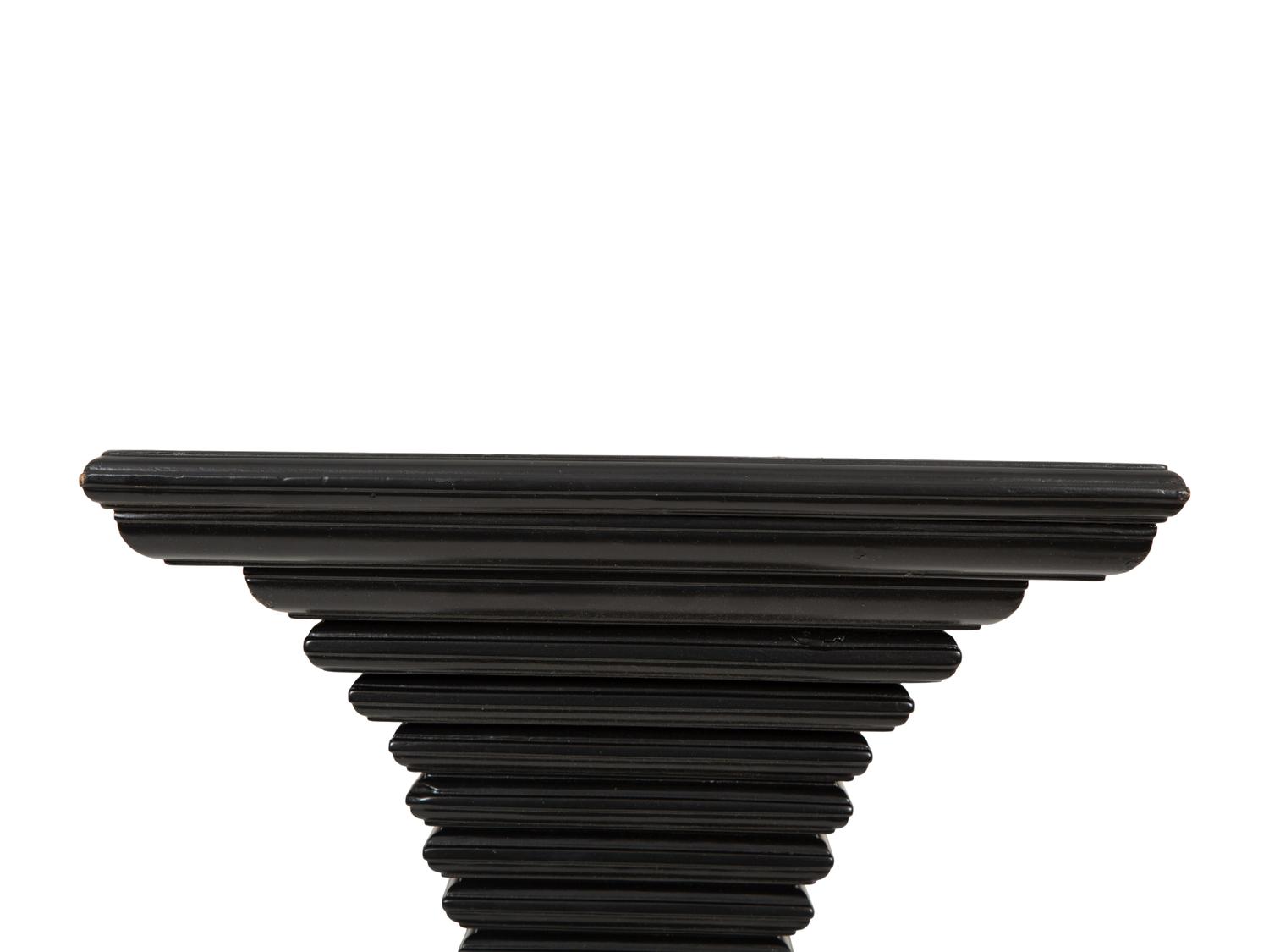 A Pair of Ebonized Wall Brackets