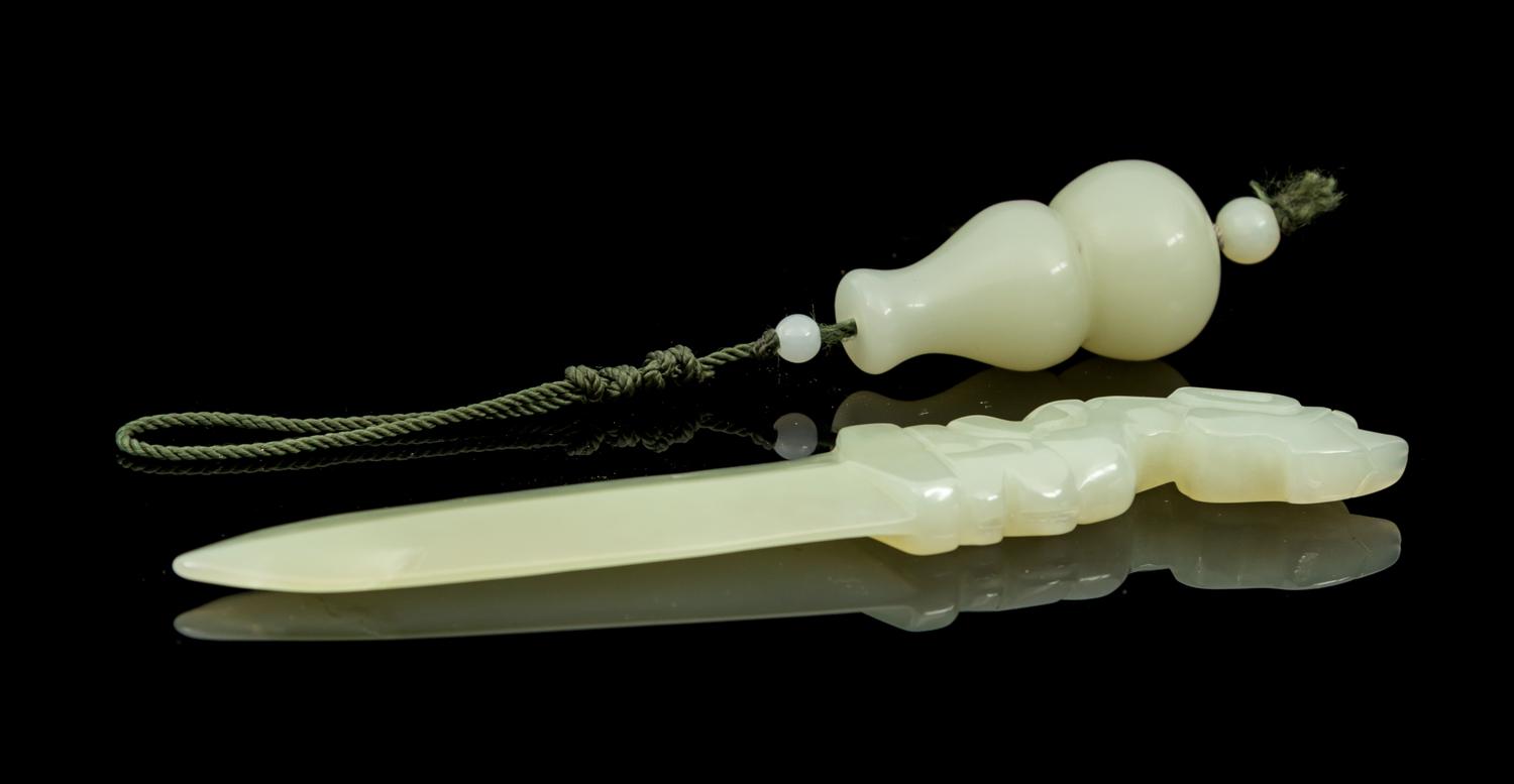 Two Jade Articles Length of first 6 1/4 inches.