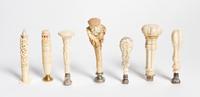 A Collection of Carved Ivory and Bone Seals, Height of tallest 4 3/4 inches.