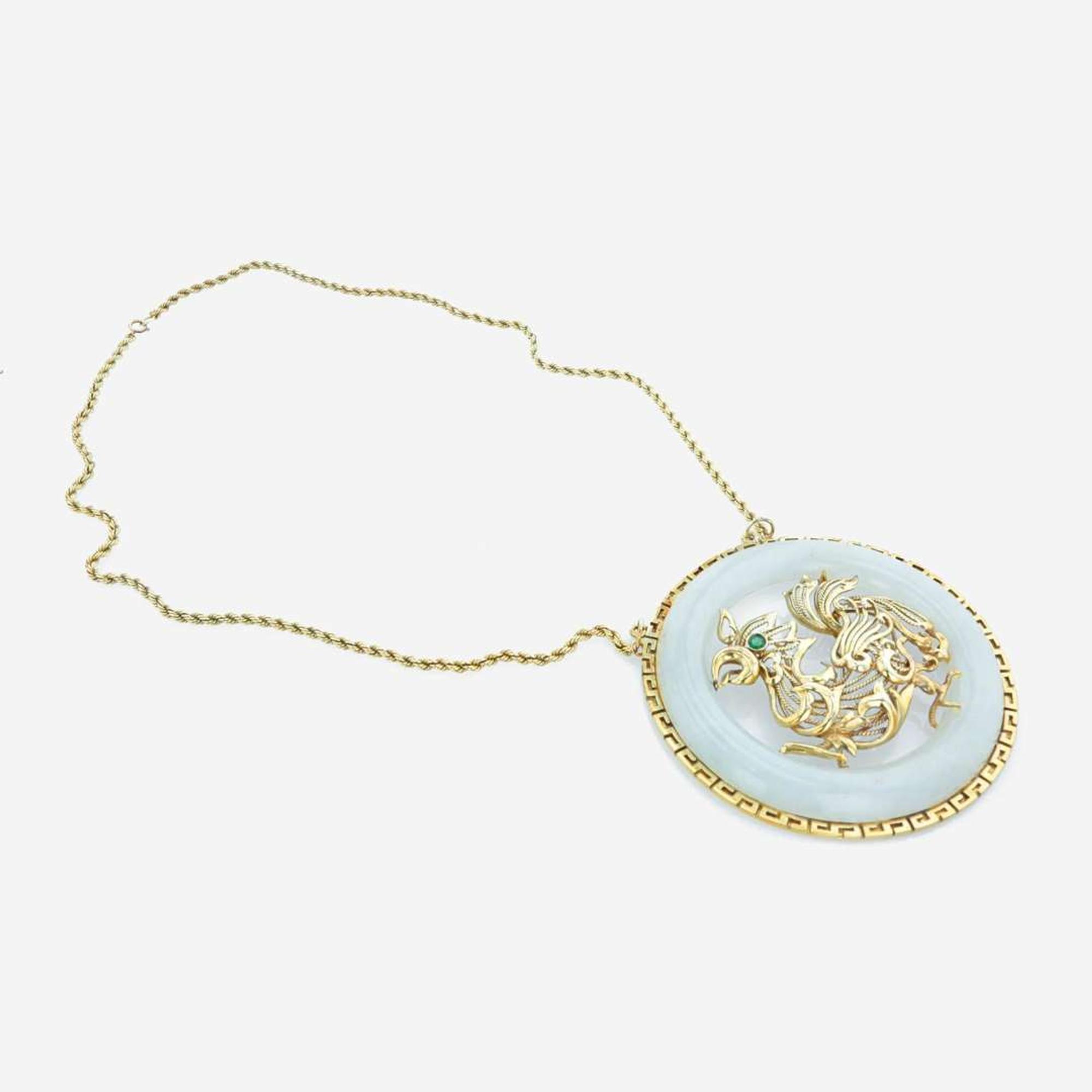 A 14K yellow gold and jade necklace Year of the Rooster