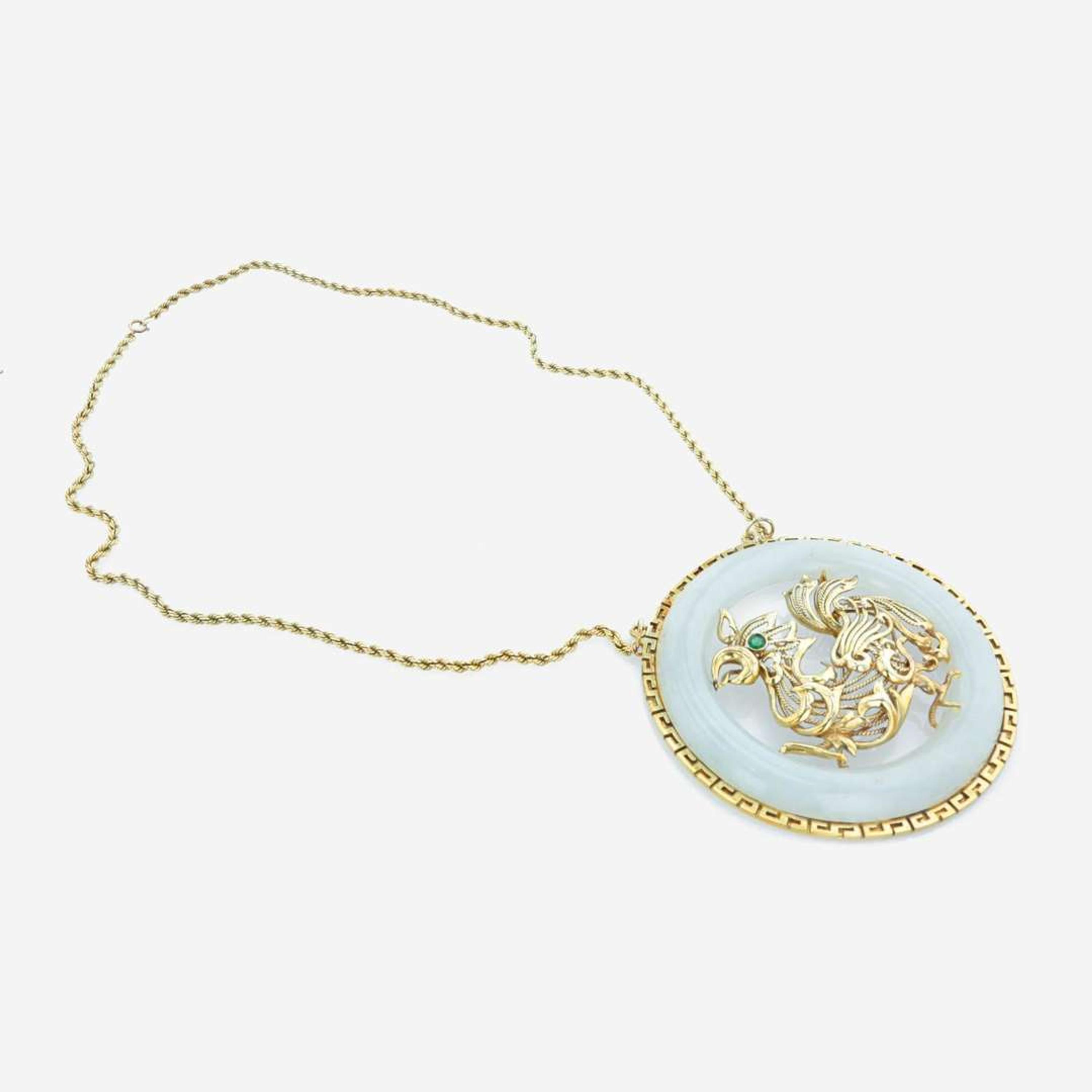 A 14K yellow gold and jade necklace Year of the Rooster
