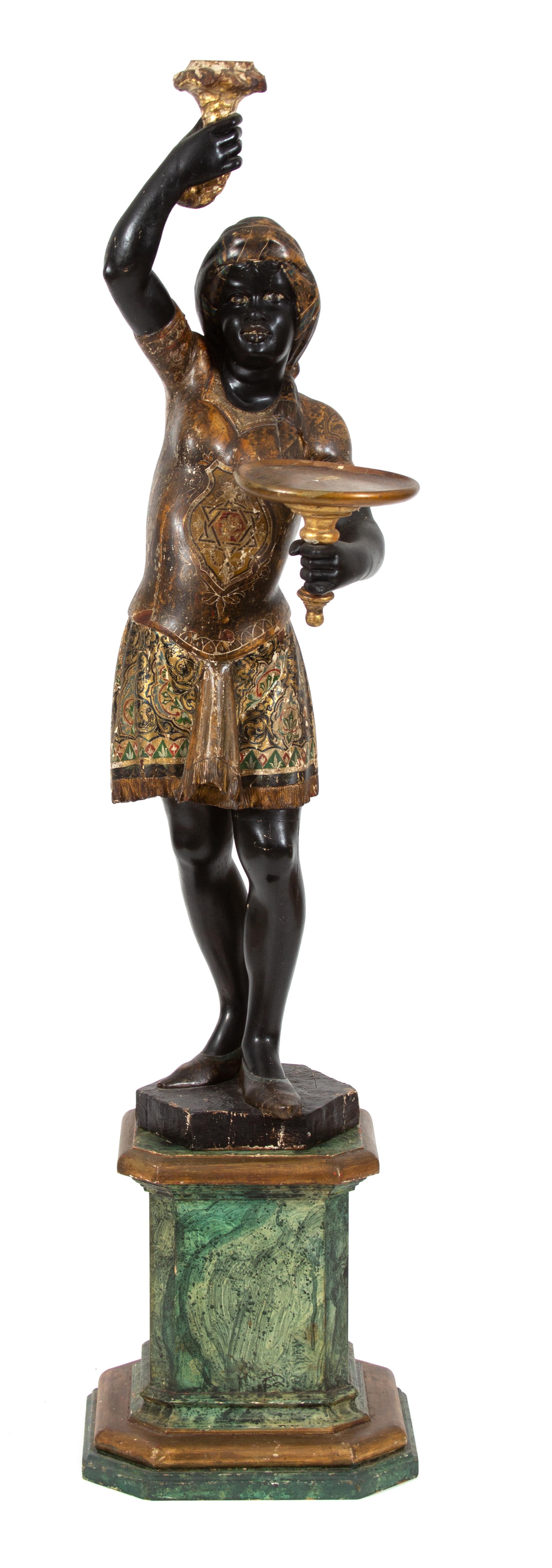 A Venetian Polychrome and Gilt Decorated Blackamoor Height 66 inches. — 19TH CENTURY