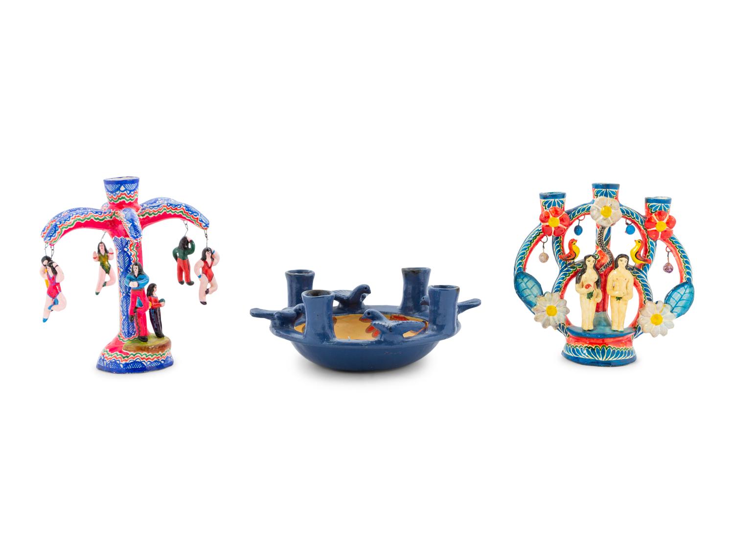 A Collection of Mexican Pottery Candelabra