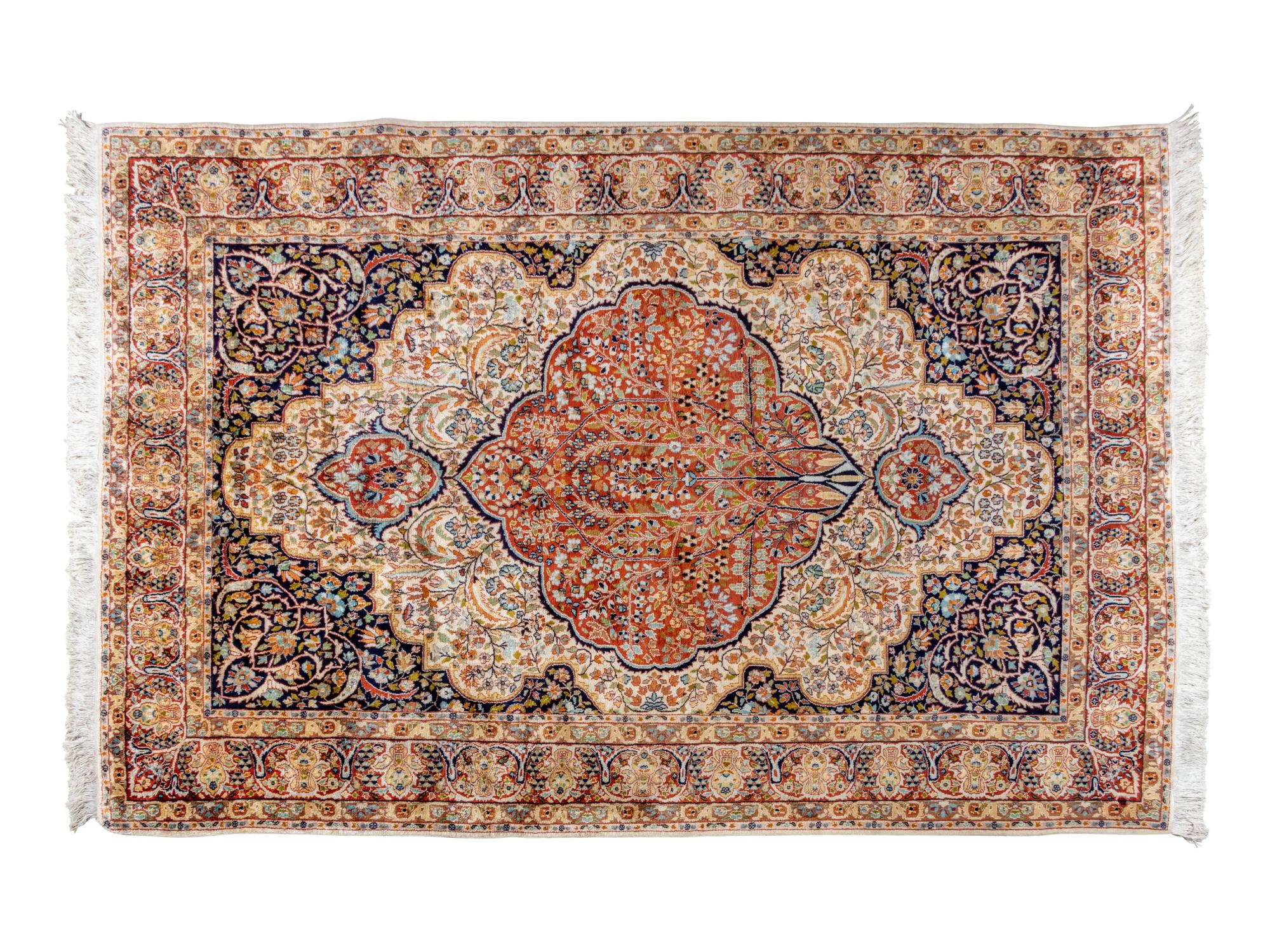 A Turkish Silk Hereke Rug