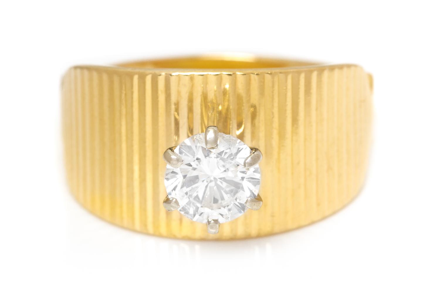 A 14 Karat Yellow Gold and Diamond Solitaire Ring, 3.70 dwts.