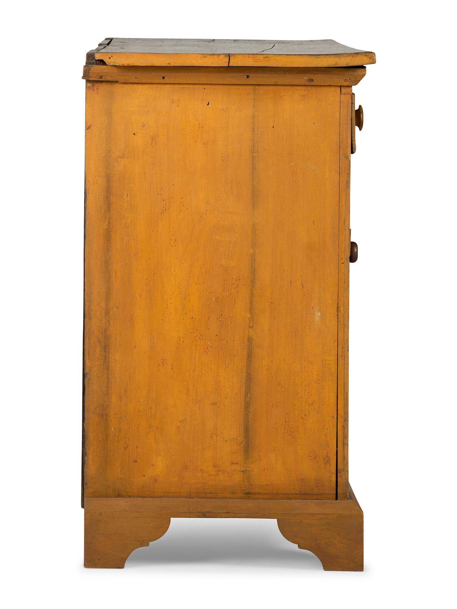 A Country Yellow Painted Pine and Poplar Cupboard