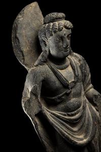 A Gandharan Grey Schist Figure of Maitreya