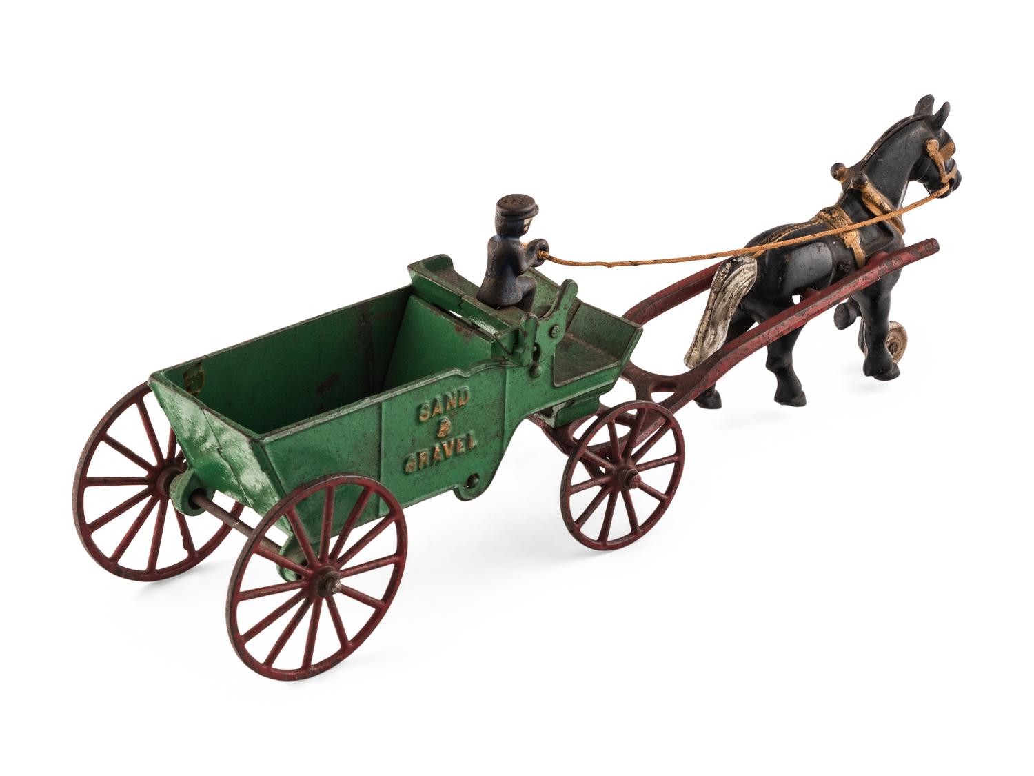 A Group of Three Cast Iron Horse-Drawn Carts