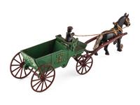 A Group of Three Cast Iron Horse-Drawn Carts