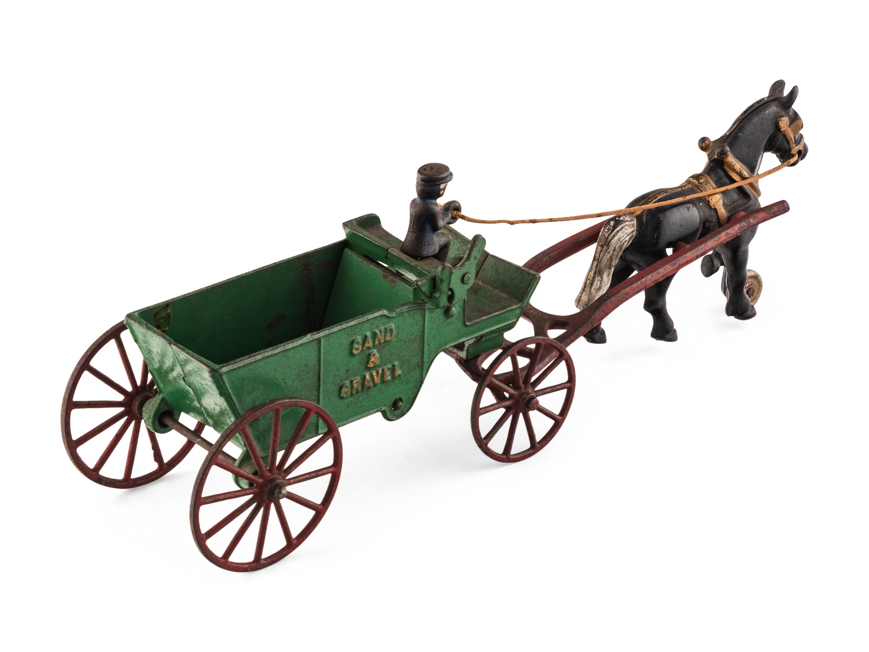 A Group of Three Cast Iron Horse-Drawn Carts