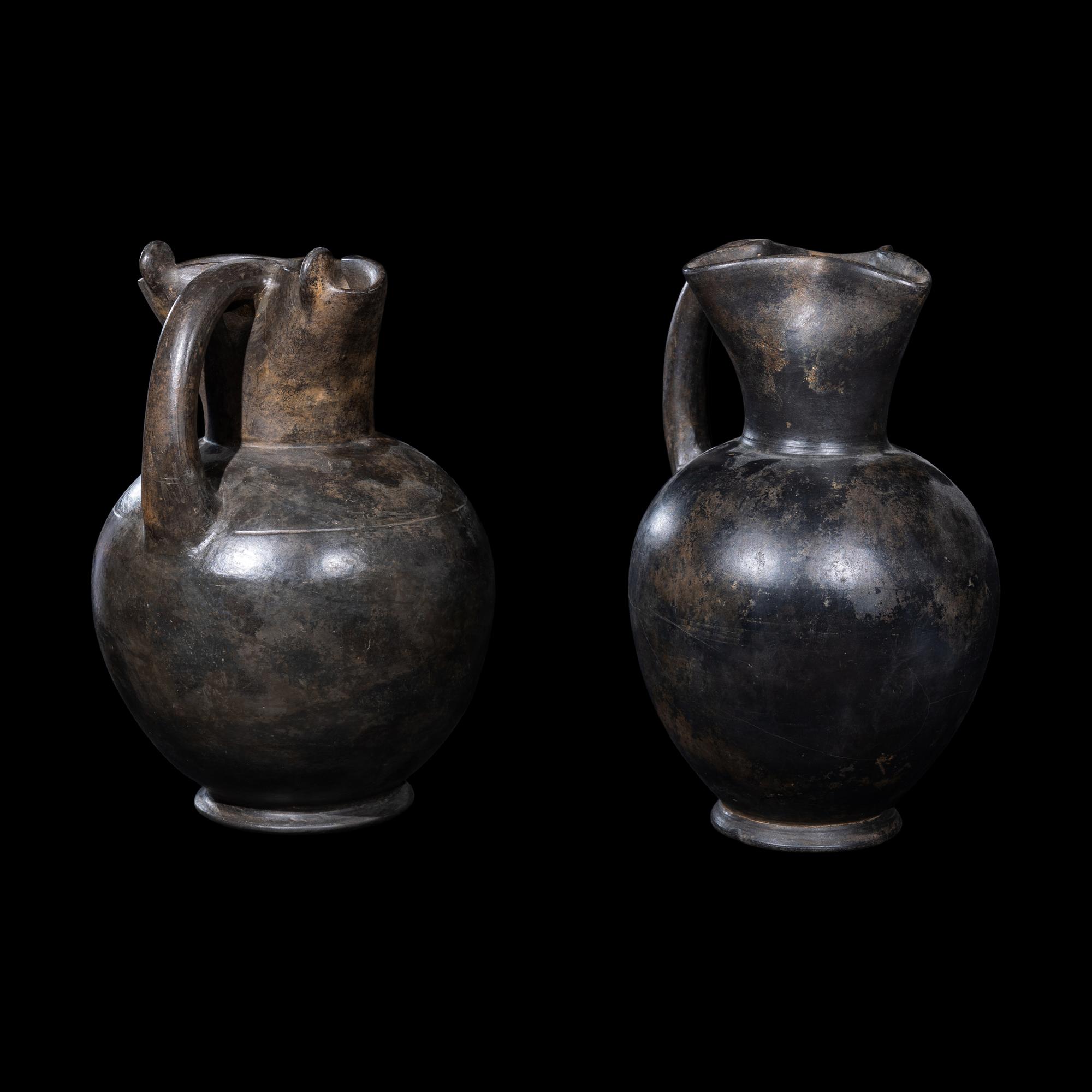 Two Etruscan Bucchero Oinochoai