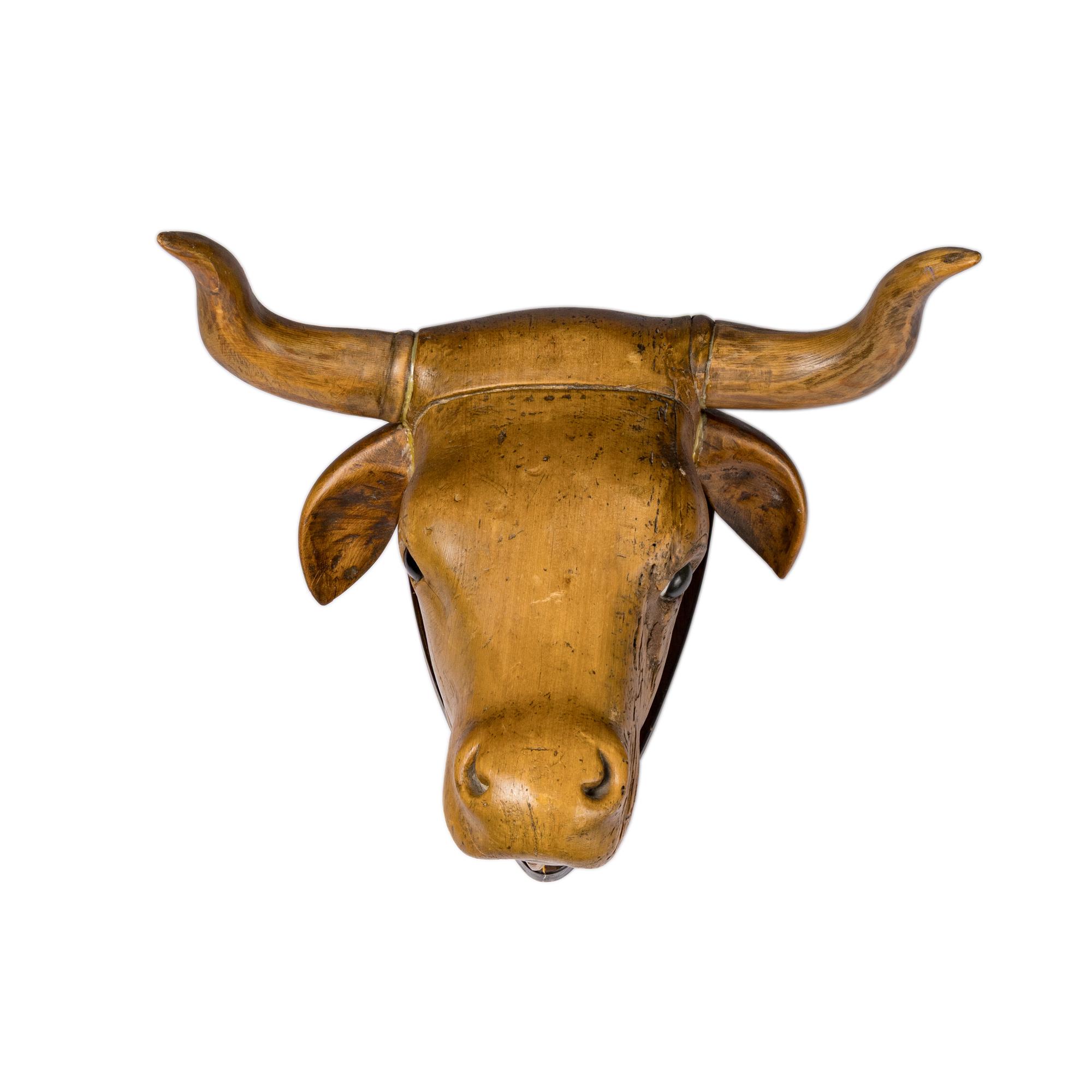 A Carved Wood Bull's Head Mount